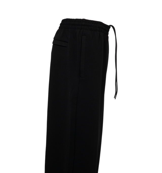 Image 3 of 3 - BLACK - WARDROBE.NYC Semi Matte Track Pants featuring elasticated waistband, consealed drawstring, slip pockets and wide legs. 60% viscose, 30% polyamide, 10% elastane. 