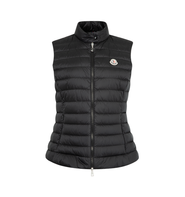 Image 1 of 2 - BLACK - MONCLER Igens Down Vest featuring recycled longue saison, water-repellent main fabric, recycled longue saison lining, down-filled, collar with snap button closure, zip closure and zipped pockets. 100% polyamide/nylon. Padding: 100% polyester. Made in Romania.