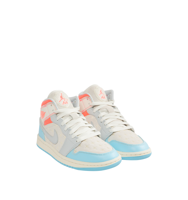 Image 2 of 5 - BLUE - JORDAN Air Jordan 1 Mid Sneaker featuring leather, synthetic leather and textile upper, foam midsole, Nike Air cushioning and rubber outsole with pivot circle.