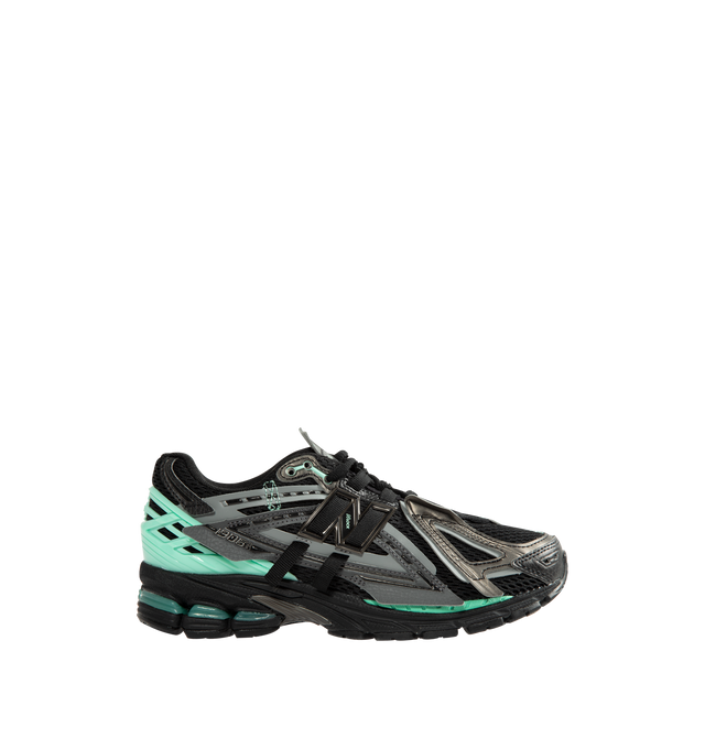 Image 1 of 5 - BLACK - New Balance Unisex 1906A "Tech Explosion / Black Bright Mint" Sneakers feature a performance-inspired silhouette rooted in early-2000s running design and equipped with advanced cushioning technologies for all-day comfort. Built with a breathable mesh upper, mesh underlays, and curvilinear synthetic overlays, this updated style combines technical heritage with a modern aesthetic. The sole unit pairs ACTEVA LITE cushioning, ABZORB SBS heel pods, and an N-ergy outsole for responsive co