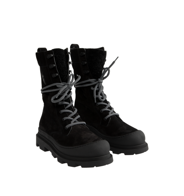 Image 2 of 4 - BLACK - Moncler Women's Vera High Suede & Shearling Lace-Up Boots are crafted from supple suede and long-haired lambskin, combining rugged cold-weather styling with lightweight comfort. Designed with a lace-up closure and a functional back loop that secures the laces while allowing the shaft to be styled structured or slouchy, these calf-height designer boots are finished with a comfortable leather insole and a rubberized TPU sole with micro-foam filler. Upper: Cow Suede and Long-Haired Lambs