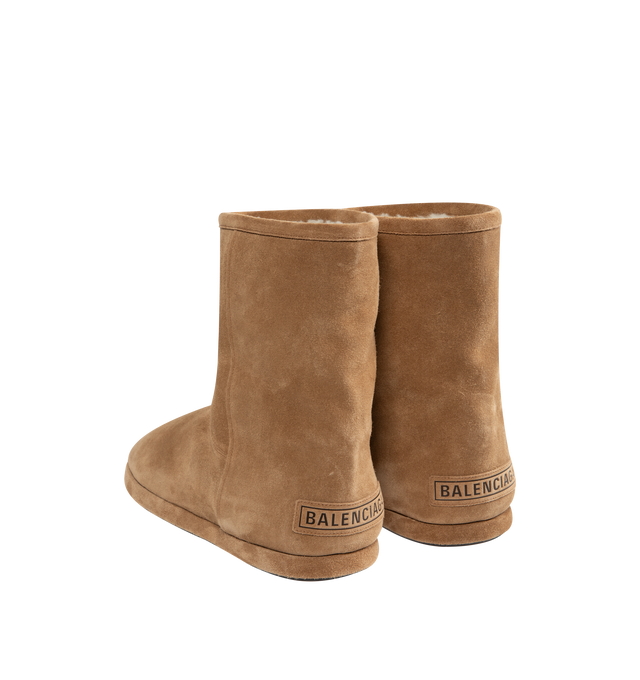 Image 3 of 4 - BROWN - BALENCIAGA Alaska Soft Bootie featuring split calfskin, wool and synthetic material, round toe, Balenciaga logo debossed on the back and tone-on-tone sole. Upper: calfskin, wool, polyester, acrylic. Sole: TPU, bio-based TPU. Insole: wool, polyester, acrylic. Made in Italy.