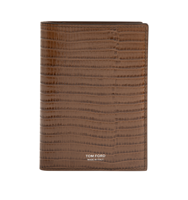 Image 1 of 3 - BROWN - Tom Ford Passport Holder is crafted from soft grain calf leather and features the signature elongated T detail. This designer combines refined craftsmanship with elevated functionality for daily use. Main Material: 100% Calf Leather. Made in Italy.