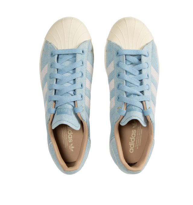Image 5 of 5 - BLUE - Adidas Superstar Sneakers 82 (Mens) are a lace-up, low-top style with a shell toe and heel tab, canvas uppers with suede details, and premium rubber outsoles. Unisex style in men's sizing. Made in Indonesia.