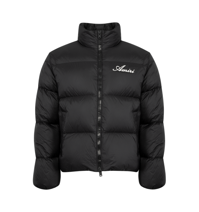 Image 1 of 3 - BLACK - AMIRI Bones Down Puffer Jacket featuring a logo at the chest, signature bone graphics on each sleeve, stand collar, drop shoulders, long sleeves, elasticized cuffs, waist zip pockets and two-way front zip closure. 100% nylon.