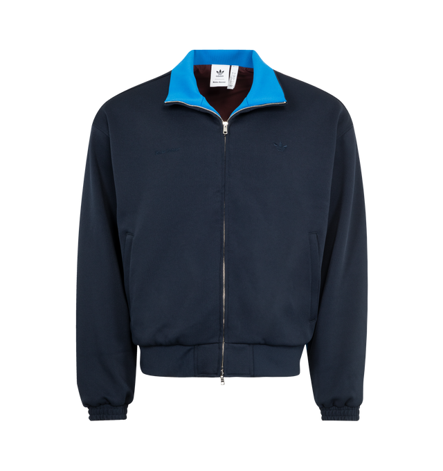 Image 1 of 2 - NAVY - Adidas x Wales Bonner Pique Track Top featuring two-way front zipper closure, side slant pockets, embroidered logo and jersey fabric. 94% recycled polyester, 6% spandex.