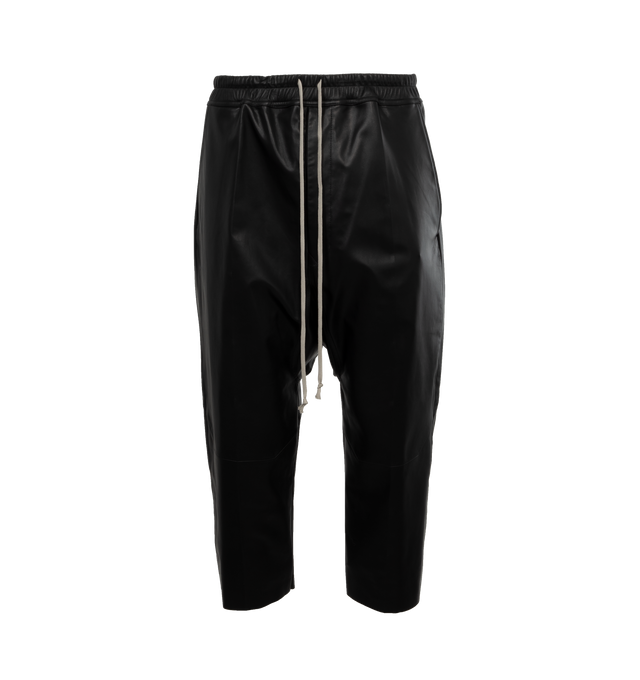 Image 1 of 4 - BLACK - RICK OWENS Cropped Leather Pants featuring paneled construction, drawstring at elasticized waistband, four-pocket styling, button-fly, creased legs, gusset at inseam, full cupro satin lining and horn hardware. 100% lambskin. Lining: 100% cupro. Made in Moldova. 
