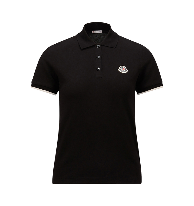 Image 1 of 1 - BLACK - MONCLER Polo Shirt featuring cotton piquet, collar, short sleeves, snap button closure, striped cuffs and logo patch. 100% cotton.