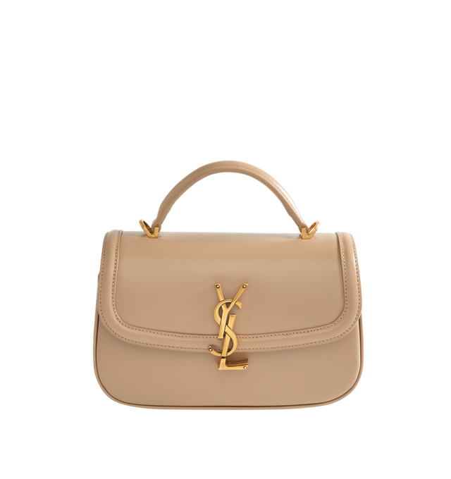 Image 1 of 3 - NEUTRAL - Saint Laurent Women's Mini Top-Handle Bag is crafted from box calfskin leather and features the iconic Cassandre sliding clasp closure, a structured top handle, a detachable and adjustable shoulder strap, bronze-tone hardware, a suede-lined interior, one card slot, and a rear flat pocket. This designer leather top-handle bag combines timeless elegance with versatile styling for day-to-evening wear. Main Material: Calfskin Leather. Lining: Suede. Hardware: Brass. Dimensions: 19.5 x 1