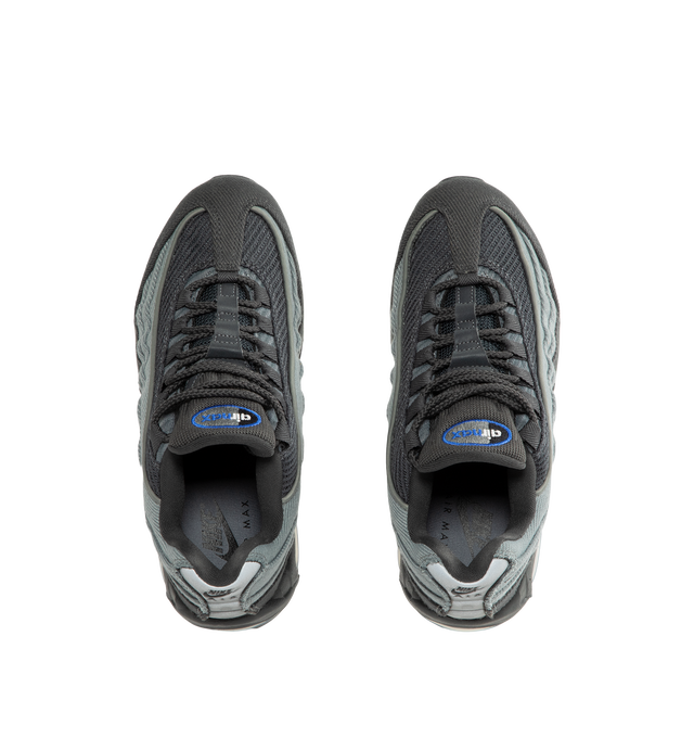 Image 5 of 5 - GREY - Nike Men's Air Max 95 Big Bubble Sneaker featuring textile and synthetic leather, visible Max Air cushioning, flex grooves in the midsole and outsole, foam midsole and rubber outsole.