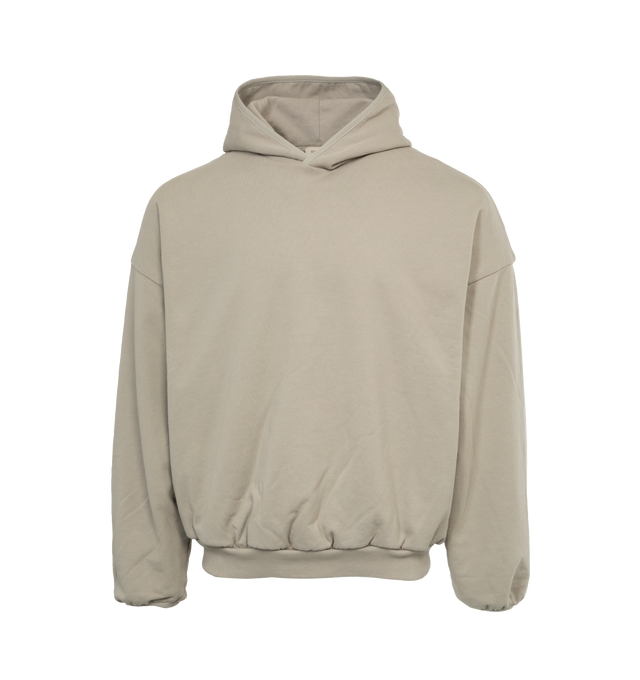 Image 1 of 3 - GREY - FEAR OF GOD Bound Hoodie featuring front kangaroo pocket, attached hood and ribbed cuffs and hem. 100% cotton. 