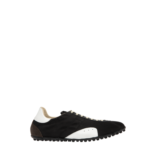 Image 1 of 5 - BLACK - MAISON MARGIELA Sprinters Low-Top Sneakers featuring drill cotton with vintage treatment, stripe down the center of the toe area, cleated rubber sole with numerical logo details, logo label on the tab, white stitching at the back and rubber sole. 54% polyester, 46% cotton. 100% calf leather. Made in Italy.