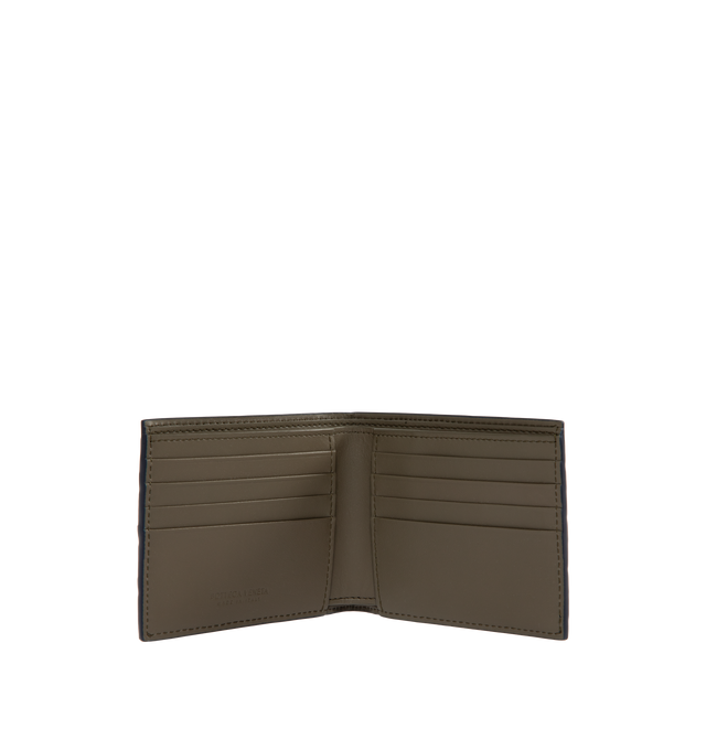 Image 3 of 3 - NAVY - BOTTEGA VENETA Intrecciato Bi-Fold Wallet featuring intrecciato calfskin leather wallet with contrasted interior, eight card slots, two bill compartments, two additional pockets. 3.7 x 4.3 x 0.4. Calfskin. Made in Italy.