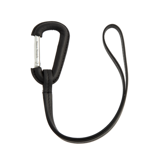 Image 1 of 2 - BLACK - Maison Margiela Mousqueton Charm is crafted from polished palladium-finish metal and features a utilitarian mousqueton clasp design inspired by functional hardware. Part of the Maison Margiela Fall/Winter 2026 collection, this statement accessory combines industrial influences with the house's signature minimalist aesthetic, making it ideal for attaching to bags, keys, or belt loops. Main Material: Polished Palladium-Finish Metal. Hardware: Mousqueton Clasp Closure.