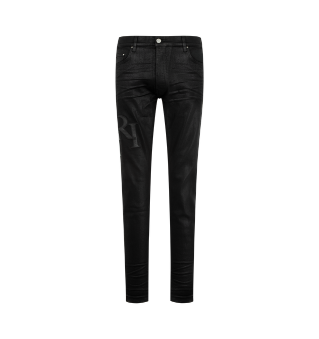 Image 1 of 3 - BLACK - AMIRI Staggered Logo Waxed Skinny Jeans featuring waxed stretch cotton denim, stacked Amiri logo on the left thigh, classic five-pocket styling and button zip closure. Cotton/polyester/elastane. Made in USA.