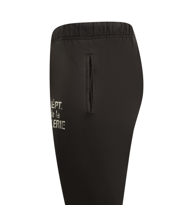 Image 3 of 3 - GREY - GALLERY DEPT. Logo Sweatpant featuring cotton-jersey jogging bottoms, relaxed fit, elasticated drawstring waistband, two side slip pockets, French logo typographic print at front, bootcut leg and jersey texture. 100% cotton. Made in USA.