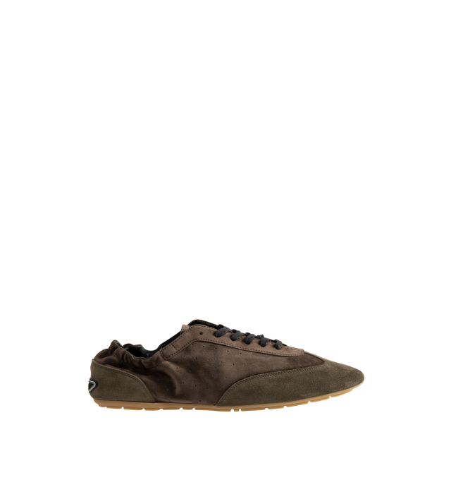 Image 1 of 5 - BROWN - Saint Laurent Men's 'Lewis 05' sneakers are cut from tonal panels of suede and velvet. Elasticated trims allow for easy entry, while a logo-embossed patch at the heel offers a signature house finish. Material: leather (suede); Lining: leather; Sole: leather insole, rubber sole; Toe shape: round toe. Made in Italy
