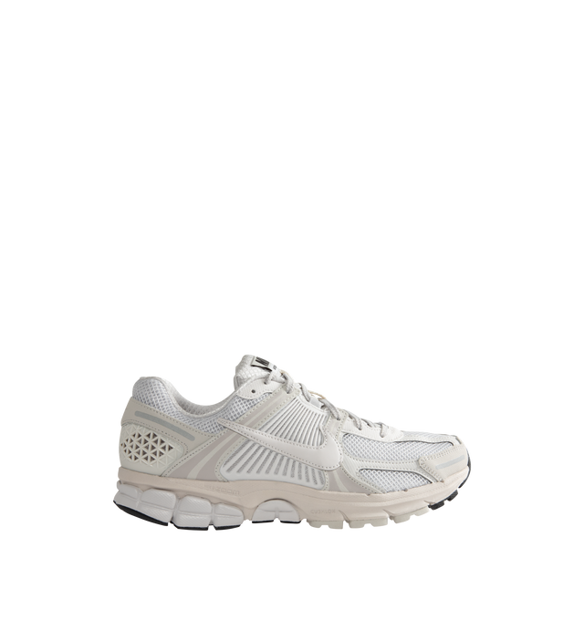 Image 1 of 5 - GREY - Nike Men's Zoom Vomero 5 SP Sneakers are a lace-up style with synthetic leather, mesh, rubber heel trim, and rubber outsole.