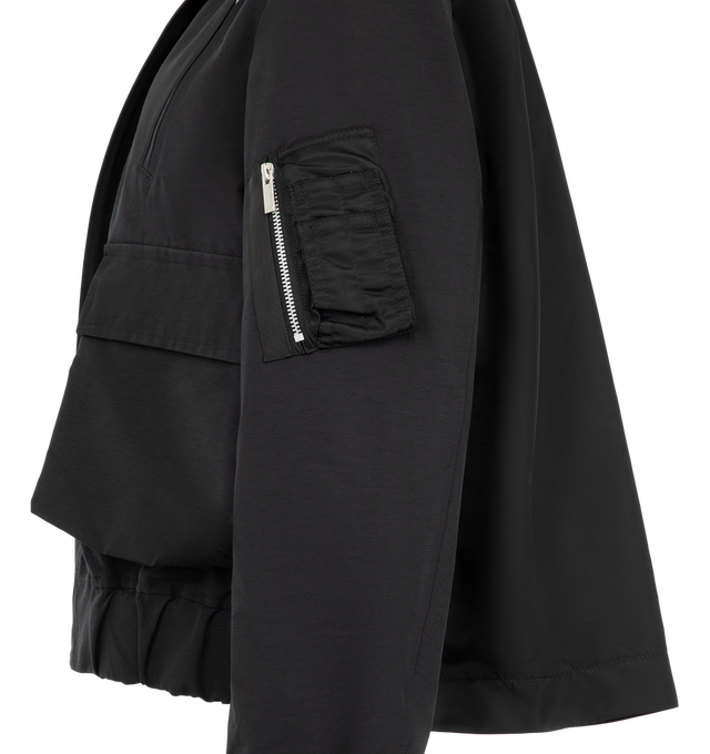 Image 4 of 4 - BLACK - Sacai Women's Grosgrain Bonding Blouson Jacket features distinct oversized front flap pockets, angled chest zip pockets, a contrasting collar, and an adjustable buttoned placket overlay. Materials: Nylon Exterior; Cotton.
