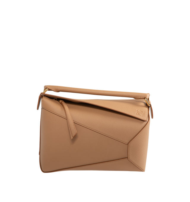 Image 1 of 3 - BROWN - LOEWE Medium Puzzle Edge Bag in soft grained calfskin featuring shoulder, crossbody or hand carry, detachable and adjustable strap, zip closure with calfskin pull, one external zip rear pocket, two internal slip pockets, herringbone cotton canvas lining and embossed Anagram. 7.7 x 11.4 x 5.5 inches. Soft grained calf. Made in Spain.