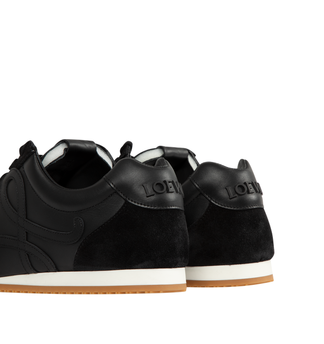 Image 3 of 5 - BLACK - LOEWE Ballet Runner 2.0 in soft calfskin featuring an asymmetrical toe shape, a sock-like internal structure, a lightweight rubber outsole that extends to the toecap, L monogram at the side, embossed Anagram on the tongue and injected rubber LOEWE on the heel tab. Soft Calf. Made in Italy.
