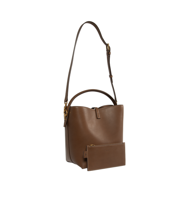 Image 2 of 3 - BROWN - SAINT LAURENT Le 37 Bucket Bag featuring suede lining, one removable zip pouch, cassandre hook closure, four metal feet, top handle and removable shoulder strap. 7.9 X 9.8 X 6.2 inches. Handle drop: 3.5 inches. 90% calfskin leather, 10% metal. Made in Italy.  