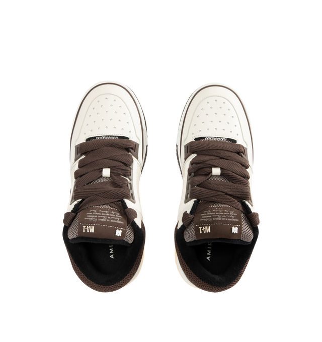 Image 5 of 5 - BROWN - AMIRI MA-1 Sneakers featuring low-top buffed leather and mesh sneakers, graphic perforations at toe, lace-up closure, logo patch at padded tongue, padded collar, logo embossed at heel counter, perforations and logo hardware at sides, terrycloth lining, logo graphic embossed at textured rubber midsole and treaded rubber sole. Upper: leather, textile. Sole: rubber.