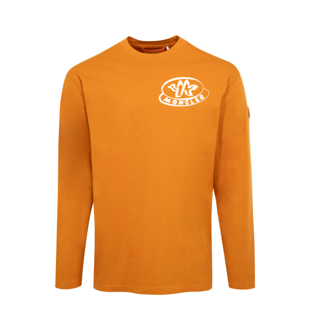 Image 1 of 2 - ORANGE - MONCLER Logo T-Shirt featuring organic cotton jersey, crew neck, long sleeves, printed logo and dyed logo patch. 100% cotton. Made in Turkey. 