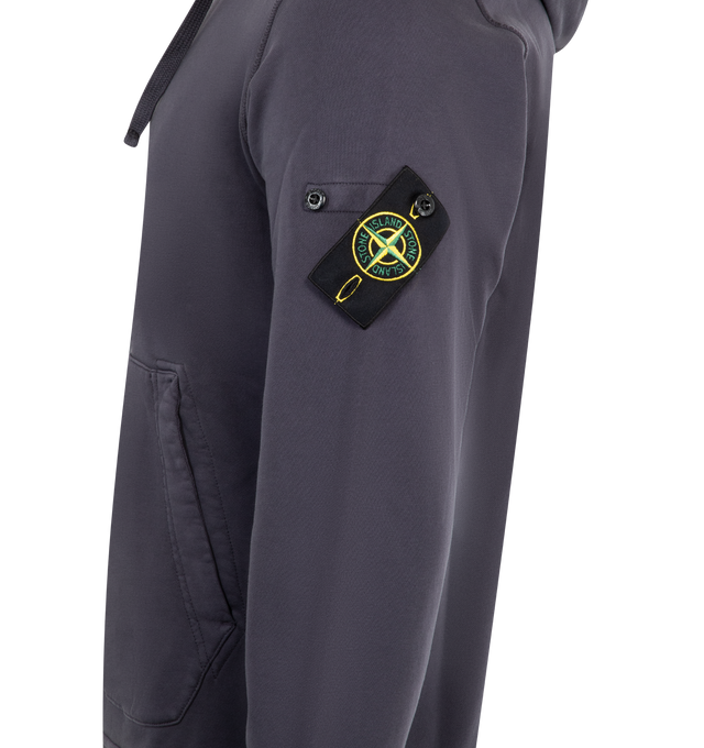 Image 3 of 3 - BLUE - STONE ISLAND Hoodie Sweater featuring drawstring hood, overlock seams, pouch pocket with slanted entrances, Stone Island badge on left sleeve, lunette under back neckline with inner lining, elasticated ribbed cuffs and bottom band and regular fit. 100% cotton.