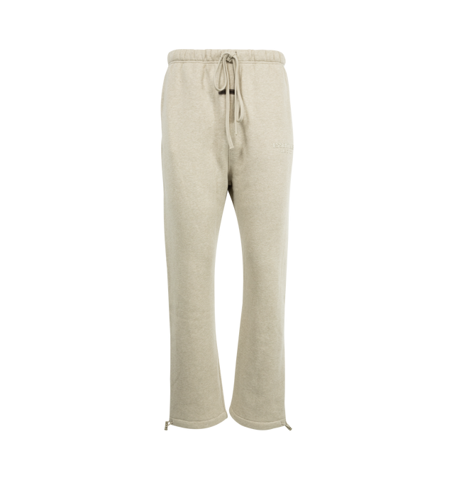 Image 1 of 3 - NEUTRAL - FEAR OF GOD Relaxed Fleece Sweatpant featuring side pockets, elastic waistband with drawstring, relaxed fit and logo details. 80% cotton, 20% polyester.
