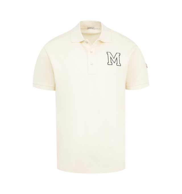 Image 1 of 3 - WHITE - MONCLER Stripe Polo featuring polo collar, 2 button placket, short sleeves, ribbed cuffs and collar and stripes on sleeve. 100% cotton.