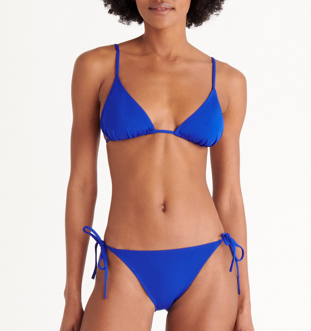 Image 4 of 6 - BLUE - ERES Malou Thin Bikini Brief Bottoms featuring side ties. Main: 84% Polyamid, 16% Spandex. Second: 68% Polyamid, 32% Spandex. Made in France. 