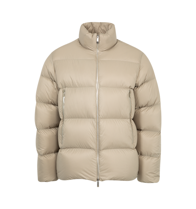 Image 1 of 3 - NEUTRAL - Moncler Tarn Puffer Jacket has an adjustable hood, a zipper closure, zipper pockets, adjustable cuffs, an elastic hem at the back, and a silicone logo patch. Down filled. 100% polyamide. Made in Armenia.