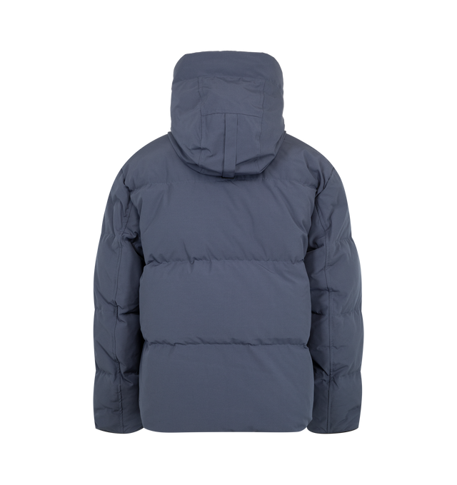 Image 3 of 4 - BLUE - Canada Goose Men's Seymour Parka is crafted from Recycled Organic Arctic Tech and features a quilt-through construction designed for protection in extreme cold-weather conditions. The parka is equipped with an adjustable snorkel hood, a tricot-lined chin guard, and a concealed snap placket over a front zip closure for enhanced coverage. Functional details include interior backpack straps for hands-free carrying, recessed rib-knit cuffs reinforced with CORDURA, two exterior zip pockets,
