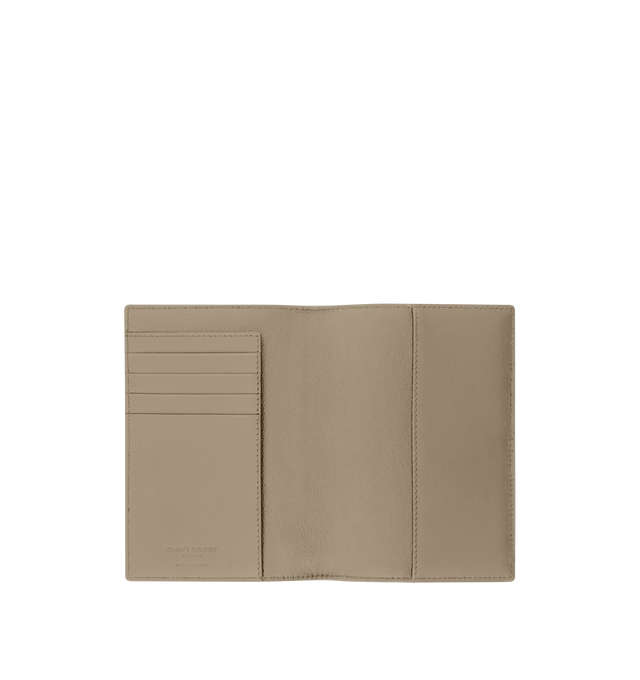 Image 3 of 3 - BROWN - SAINT LAURENT Passport Case in smooth leather featuring passport cover with internal card slots, decorated with signature, silver-tone hardware, two passport inserts and four card slots. 3.9" x 5.5" x 0.6". Calfskin. Made in Italy.