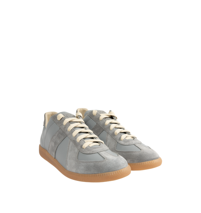 Image 2 of 5 - BLUE - MAISON MARGIELA Replica Sneakers featuring lace-up sneakers in buffed nappa calfskin and calfskin suede, contrasting sole, Maison Margiela logo label on the tab, internal Replica label, internal elastic and all-over Maison Margiela logo insole. 100% calf leather. Sole: 100% rubber. Made in Italy.