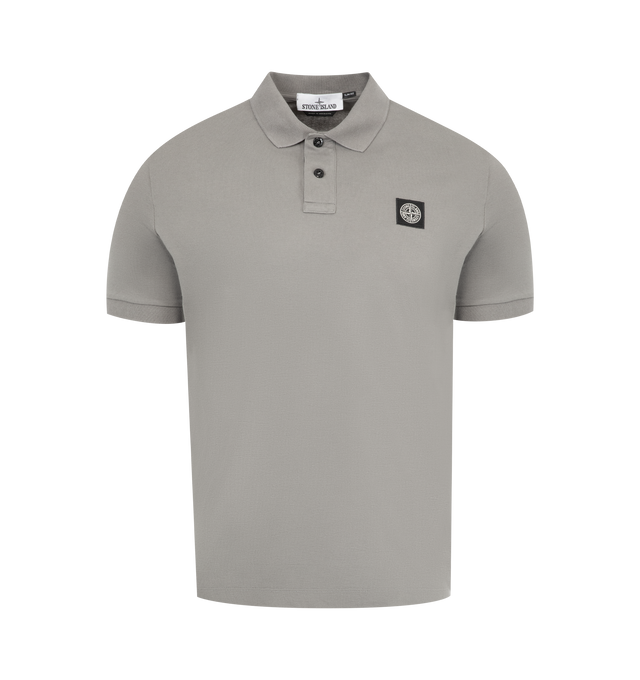 Image 1 of 2 - GREY - STONE ISLAND Polo Shirt featuring ribbed collar with two-button fastening, Stone Island Compass logo patch on chest, ribbed sleeve edge, bottom side slits with inner striped tape trim and slim fit. 95% cotton, 5% elastane/spandex.