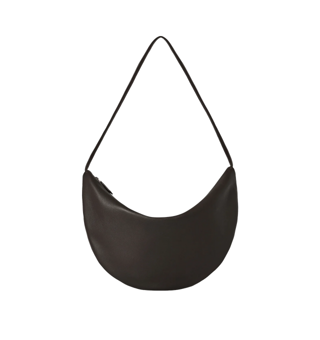 Image 1 of 3 - BROWN - THE ROW Small Izzy Bag featuring contoured shoulder bag in ultrasoft lambskin leather with slim strap and zipper closure. 13 x 7.5 x 0.8 in. Antique silver hardware finishing. 100% lambskin leather. Made in Italy.