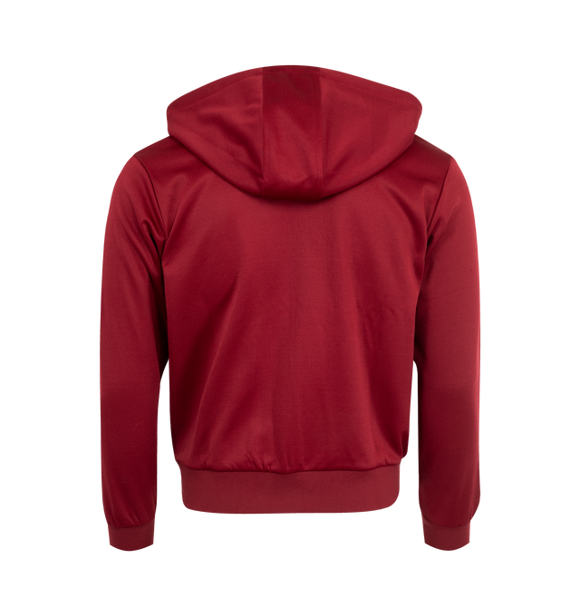 Image 2 of 3 - RED - Adidas x Wales Bonner Logo Hoodie featuring drawstring hood, two-way front zip placket, long sleeves with ribbed cuffs, chest graphic logo and ribbed hem. 61% polyester, 39% cotton.