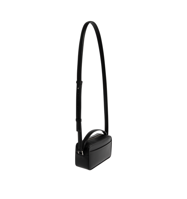 Image 2 of 3 - BLACK - JACQUEMUS Baneto leather camera bag featuring rectangular bag in smooth leather, zipper closure, zip-puller handle for hand-carrying, adjustable cross-body shoulder strap, patch pocket on front and back, interior card pocket, silver metal logo and hardware. 20cm x 10cm x 7cm. 100% cowskin. Lining: 100% cotton. Made in Italy.