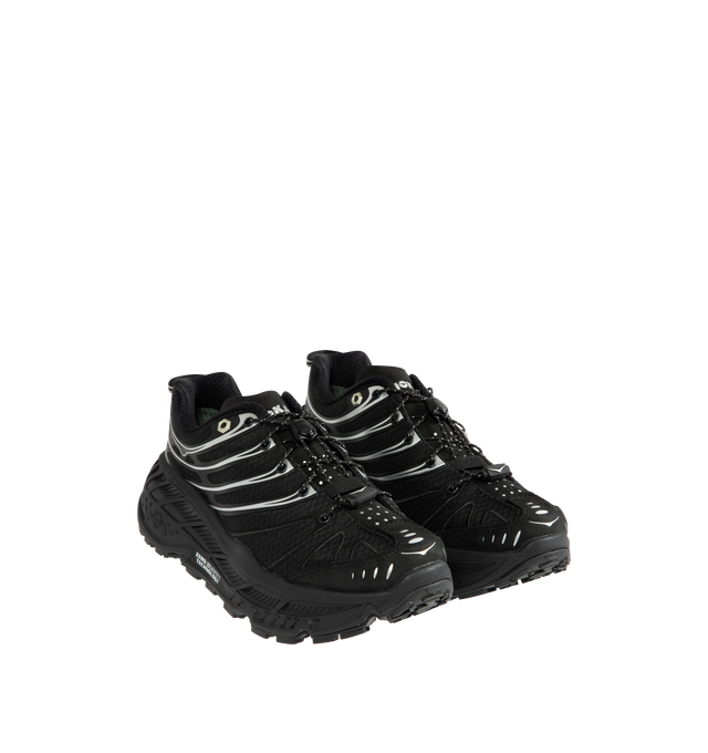 Image 2 of 5 - BLACK - HOKA Stinson EVO GTX Sneaker featuring ripstop upper, nubuck toe and heel overlays, waterproof GORE-TEX bootie construction, reflective webbing heel pull, speed-lace system and secondary lace option.