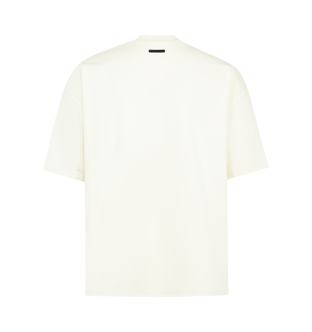 Image 2 of 2 - WHITE - FEAR OF GOD ESSENTIALS Signature 90s Pique Tee featuring medium-weight cotton/poly pique kni, crewneck, 90s fit with oversized proportions and dropped shoulders, embroidered Essentials signature logo on the front and Essentials signature label at the back collar. 80% cotton, 20% polyester.