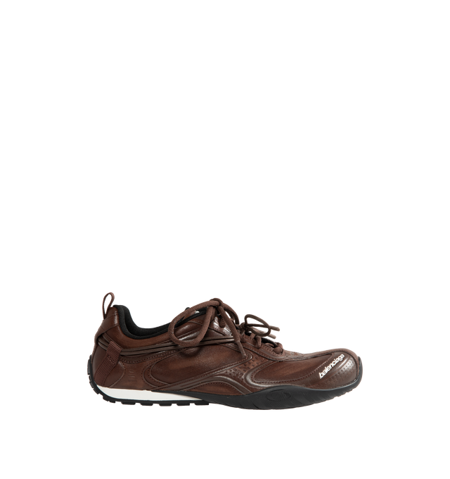Image 1 of 5 - BROWN - Balenciaga Men's Radar Leather Sneakers are crafted from premium cowskin leather and feature a streamlined low-top silhouette with a distinctive worn-in finish, double lacing system, and debossed Balenciaga and 3B Sport logo detailing. Inspired by speed and technical performance, these designer sneakers are finished with a padded foam insole, durable rubber outsole with signature loop sports icon artwork, a back pull tab, and a sleek profile for elevated everyday wear. Upper: Cowskin