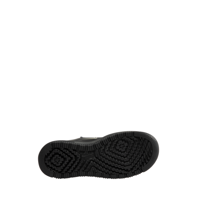 Image 4 of 5 - BLACK - Nike Men's Air Force 1 LX Shoes are crafted from genuine leather and feature the iconic Air Force 1 silhouette with a metallic Swoosh logo and leather lace cover for an elevated finish. The leather upper softens over time, while a Nike Air unit delivers lightweight cushioning. A foam midsole enhances comfort, and the rubber outsole with classic pivot-circle traction provides durability and grip. Upper: Genuine Leather. Midsole: Foam with Nike Air cushioning. Outsole: Rubber.