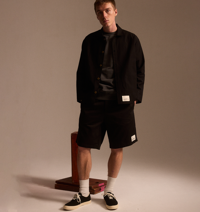 Image 5 of 6 - BLACK - OCD 27 Drawstring Bermuda Shorts featuring elastic waist, button fly, drawstring, back patch pocket and logo patch on leg. Fabric sources from Japan. 100% cotton.