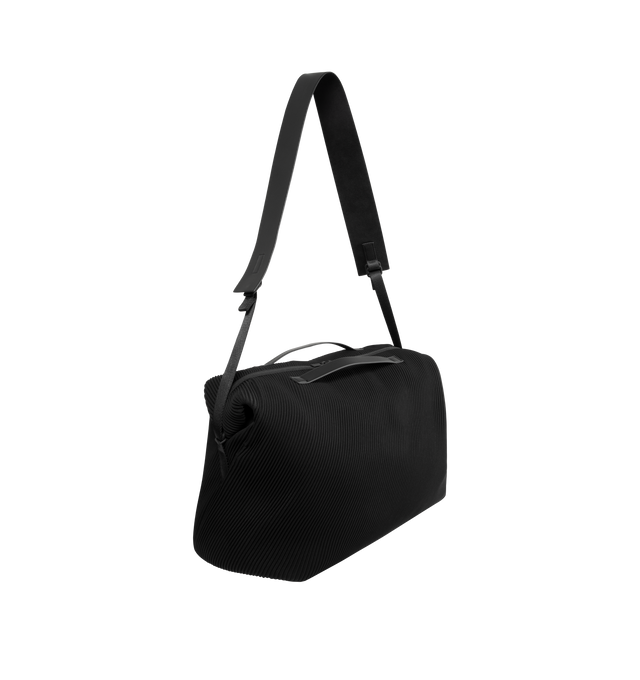 Image 2 of 3 - BLACK - ISSEY MIYAKE Pleats Travel Bag featuring large-capacity bag that can be worn on the shoulder or across the body, interior pockets and pleats. 100% polyester. Lining: 100% nylon. Made in Japan.