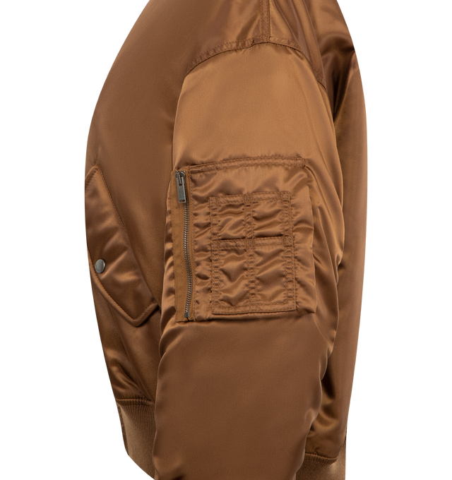 Image 3 of 3 - BROWN - SAINT LAURENT Bomber Jacket featuring drop shoulders, rib-knit trims, viscose and cotton lining, front zip closure, two welt pockets with snap-button flat at the front, one zip utility pocket at the sleeve, two inner snap-button welt pockets, baseball collar and ribbed trims. 100% polyamide. Made in Italy.