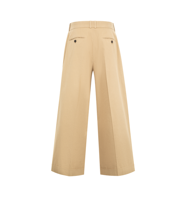 Image 2 of 3 - BROWN - THE ROW Lior Pant featuring tailored low-rise trouser in fluid Japanese wool gabardine with wide cuffed leg, front double pleats and side slash pockets. 100% wool. Made in Italy.