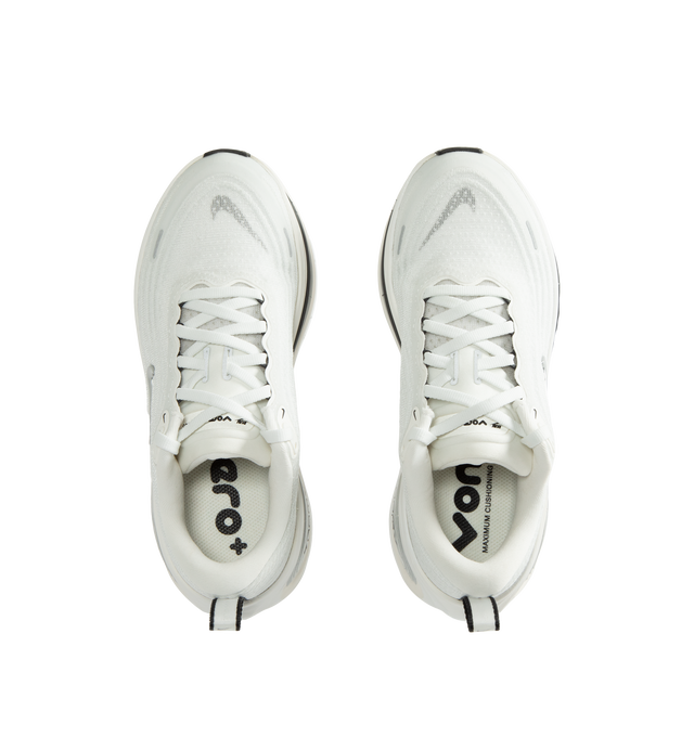 Image 5 of 5 - WHITE - Nike Women's Vomero Plus Running Shoes are engineered with a full-length ZoomX foam midsole and feature Nike's highest level of cushioning for an ultra-soft, responsive ride. Designed for everyday road running, this max-cushion silhouette combines a breathable engineered mesh upper with a high-stack platform and durable rubber outsole for lasting comfort and traction. Main Material: Engineered Mesh. Midsole: Full-Length ZoomX Foam. Outsole: High-Abrasion Rubber. Weight: Approx. 242 g