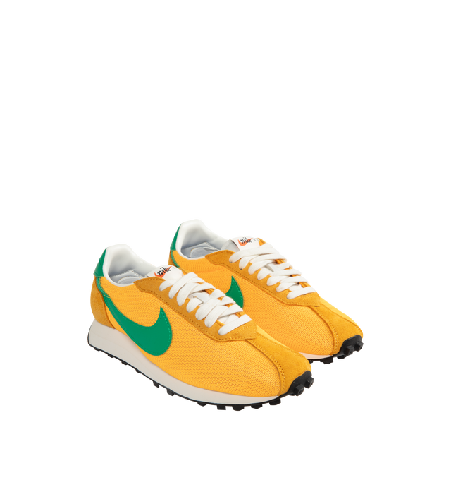 Image 2 of 5 - ORANGE - NIKE LD-1000 Sneaker featuring an upper that combines leather and textiles for a durable, breathable fit, waffle outsole provides durable traction, foam midsole and rubber outsole.